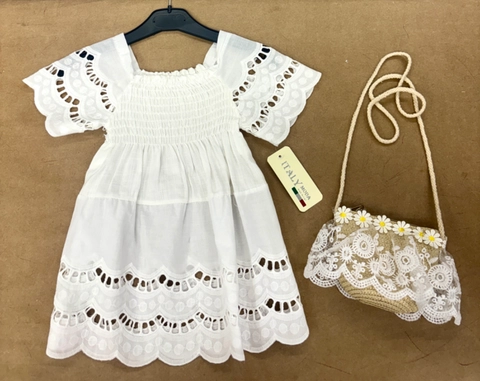 Vestido blanco calado con bolsito margaritas