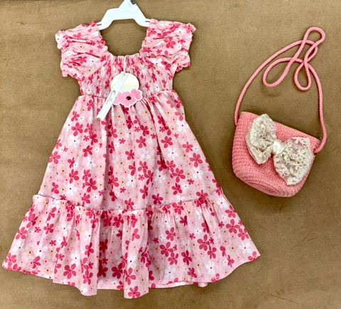 Conjunto de vestido flores con vuelo y bolso